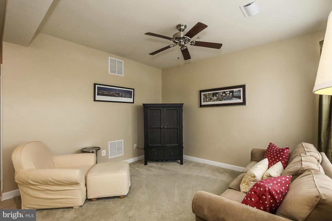 11603 Leesborough Circle Silver Spring, MD 20902 - Photo 25 of 30 a living room with furniture and a window