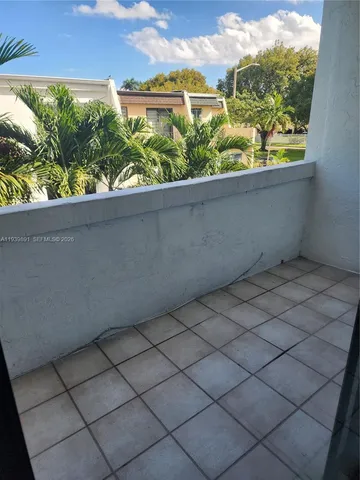 a view of a room & window