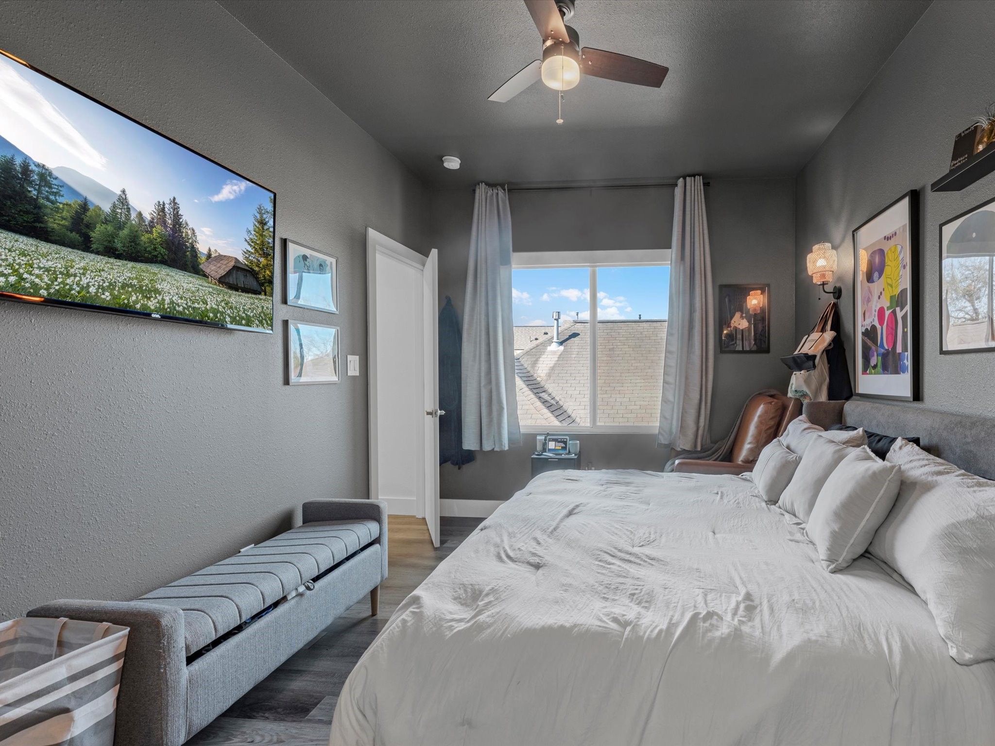 2222 Wavell Street Houston, TX 77088 - Photo 16 of 24 a bedroom with a bed and a couch