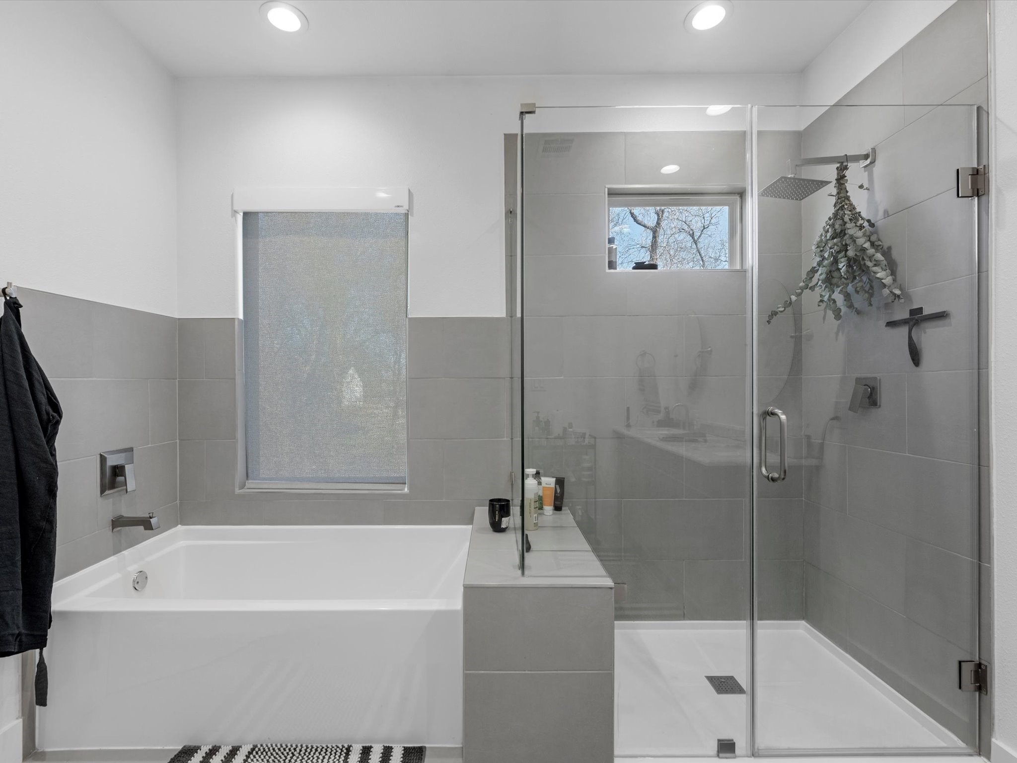 2222 Wavell Street Houston, TX 77088 - Photo 18 of 24 a white bath tub sitting next to a white shower