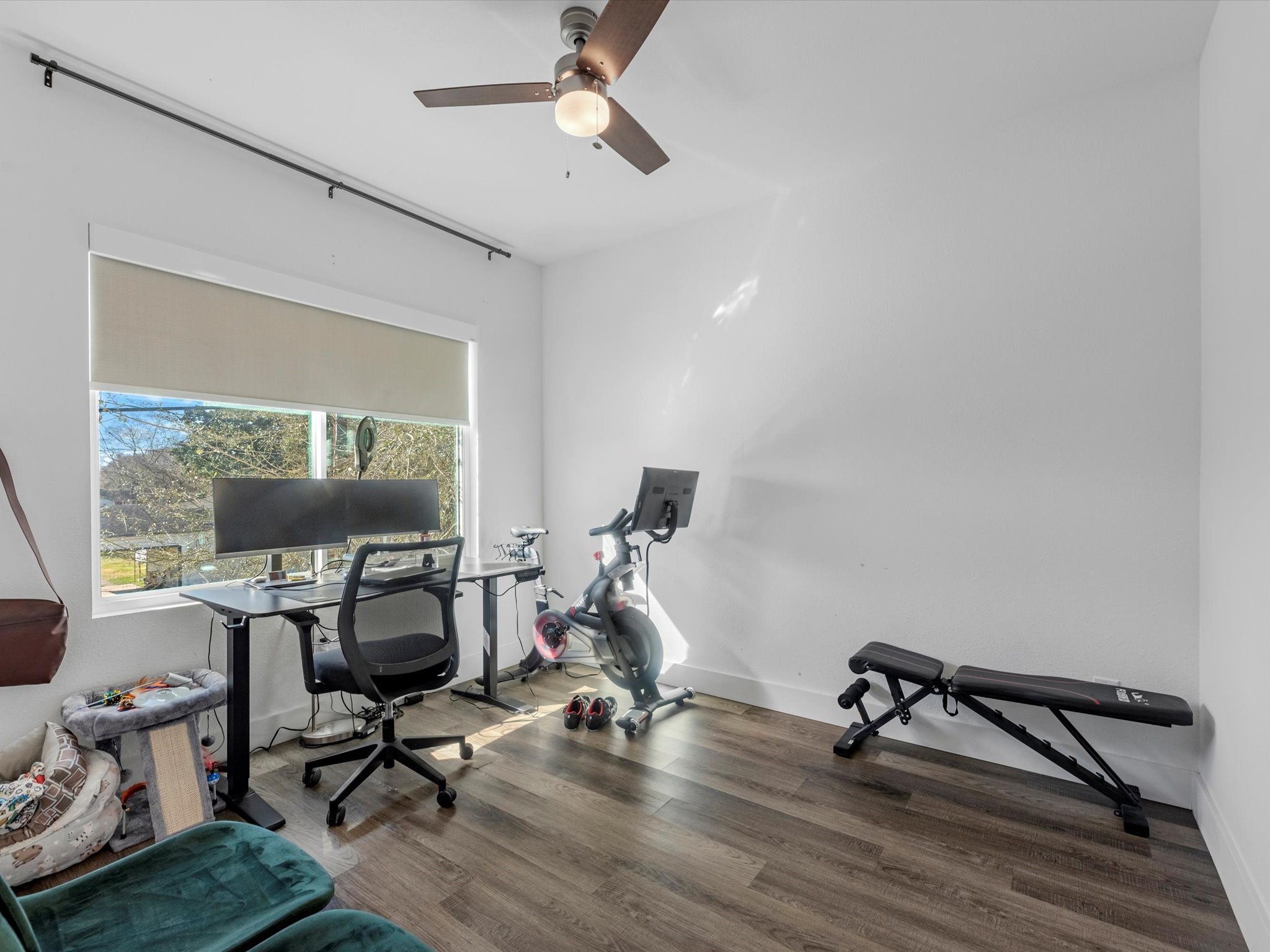 2222 Wavell Street Houston, TX 77088 - Photo 19 of 24 a view of a workspace with furniture and a window