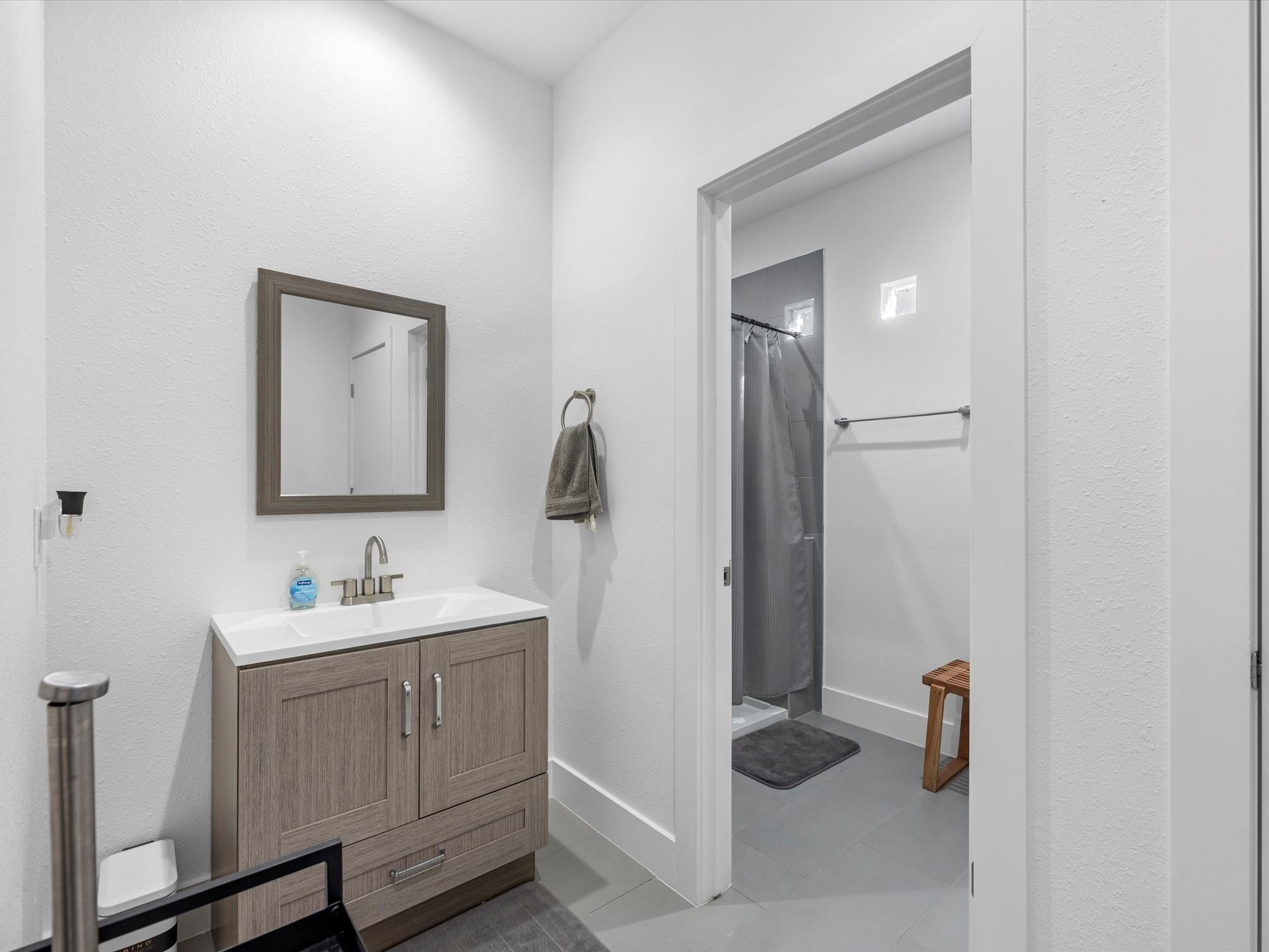 2222 Wavell Street Houston, TX 77088 - Photo 20 of 24 a bathroom with a sink and a mirror