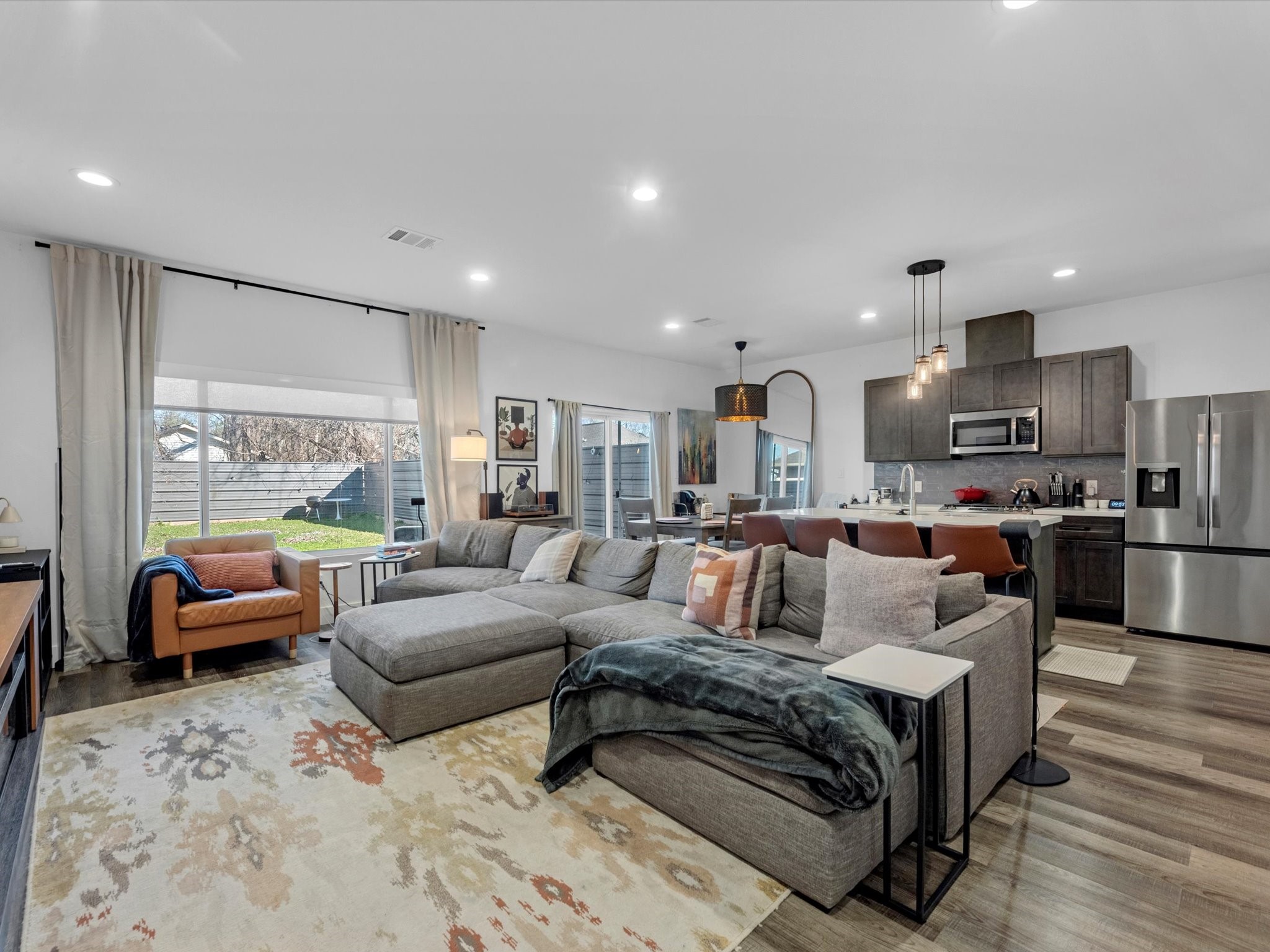 2222 Wavell Street Houston, TX 77088 - Photo 3 of 24 a large living room with furniture and a large window