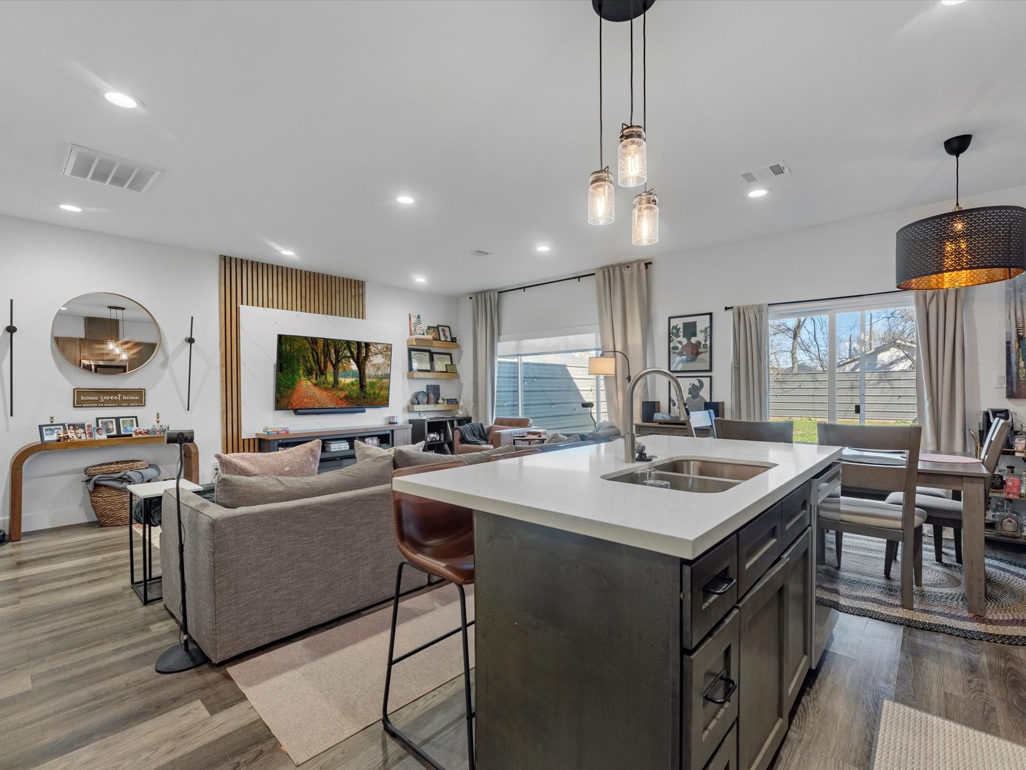 2222 Wavell Street Houston, TX 77088 - Photo 10 of 24 a open kitchen with stainless steel appliances granite countertop a sink a stove and a refrigerator