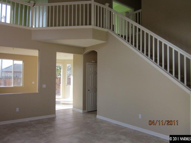 9931 Northrup Drive Reno, NV 89521 - Photo 2 of 8 a view of entryway and hall with wooden floor