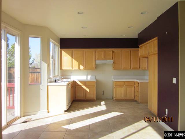 9931 Northrup Drive Reno, NV 89521 - Photo 5 of 8 a living room with a large window and furniture
