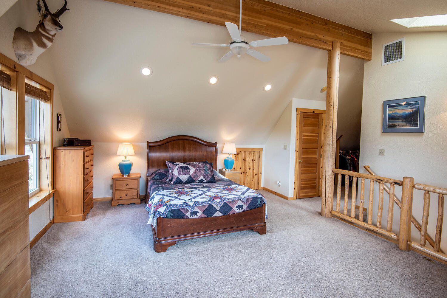 70700 Holmes Road Sisters, OR 97759 - Photo 22 of 53 Master Suite has a vaulted ceiling, skylight, ceiling fan, and 2 closets including the walk-in closet.