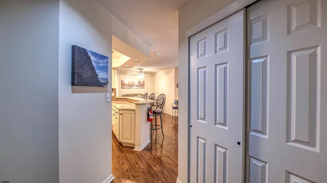 a view of a kitchen from the hallway