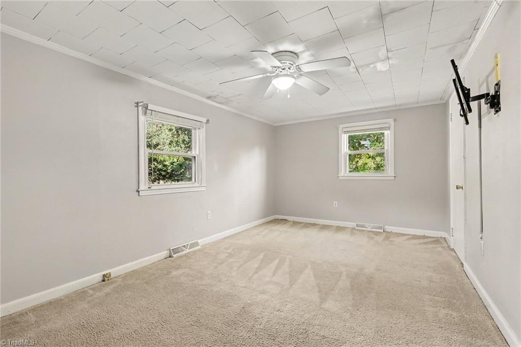 4806 Begonia Road Pleasant Garden, NC 27313 - Photo 18 of 44 Primary with ceiling fan