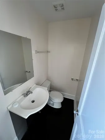 a bathroom with a sink and a toilet
