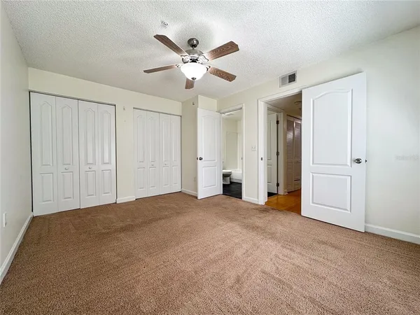 a view of a livingroom with a ceiling fan