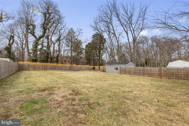 a view of backyard with green space