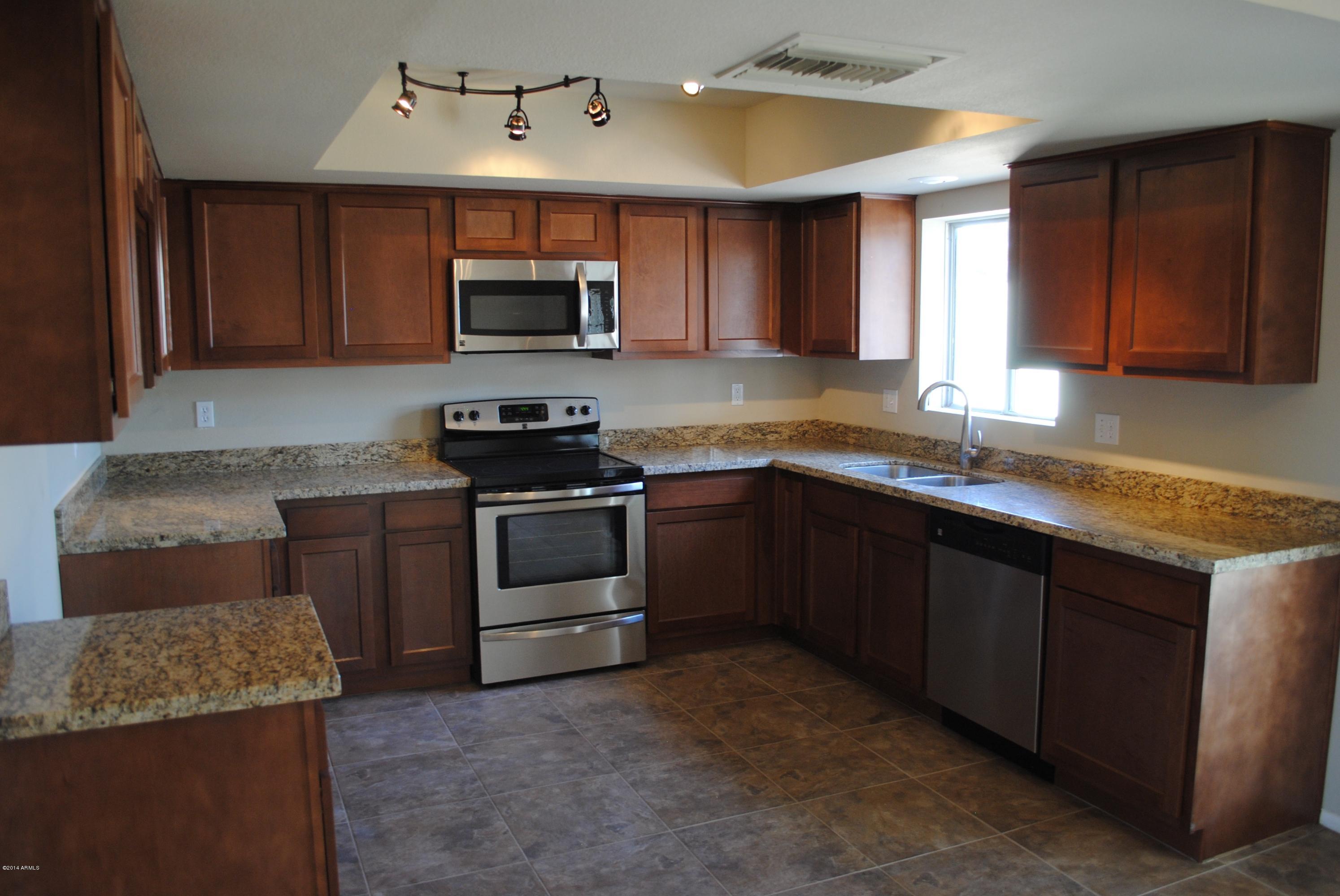 3713 West Hearn Road Phoenix, AZ 85053 - Photo 3 of 22 Oversided Kitchen