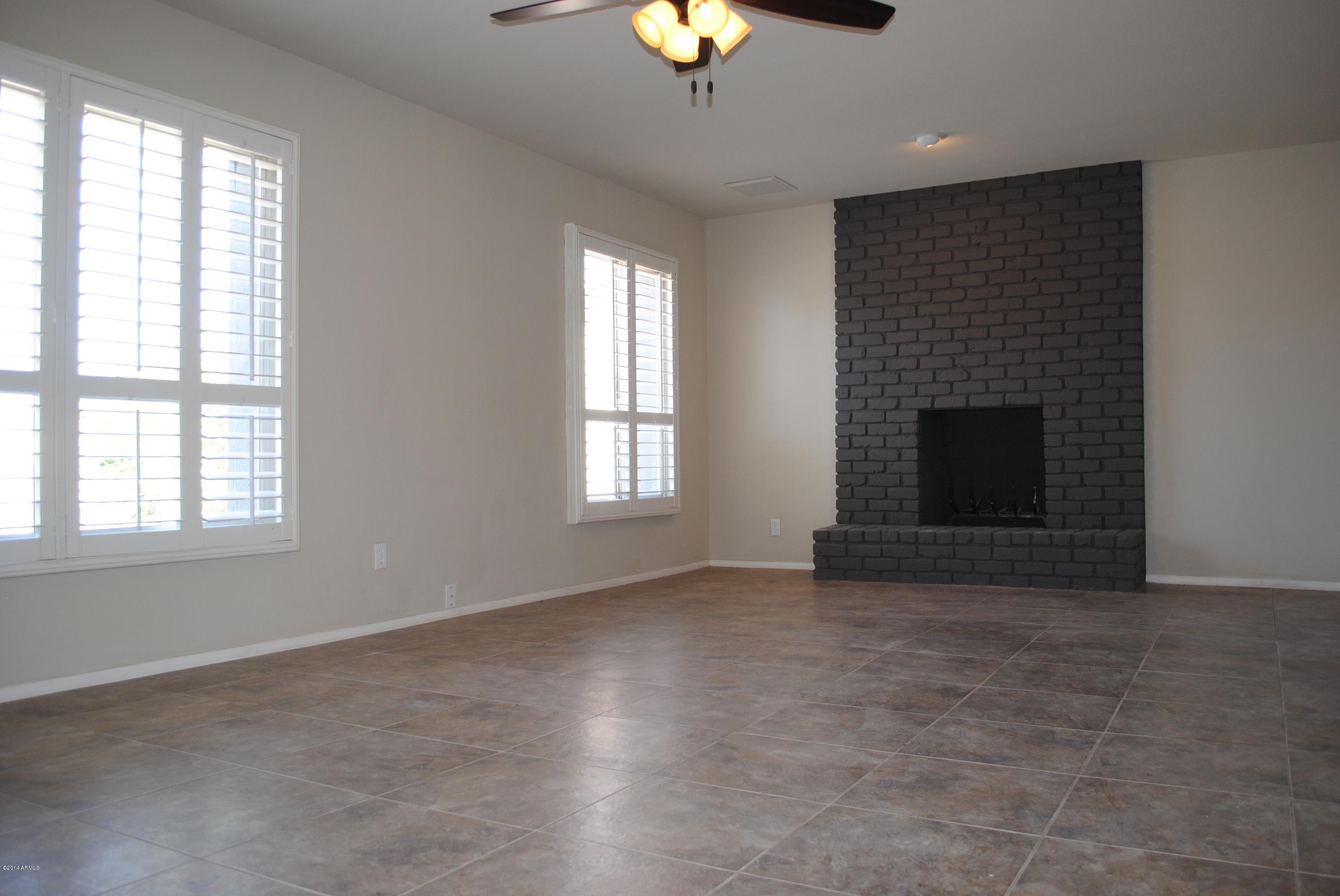 3713 West Hearn Road Phoenix, AZ 85053 - Photo 6 of 22 Livingroom with Fireplace