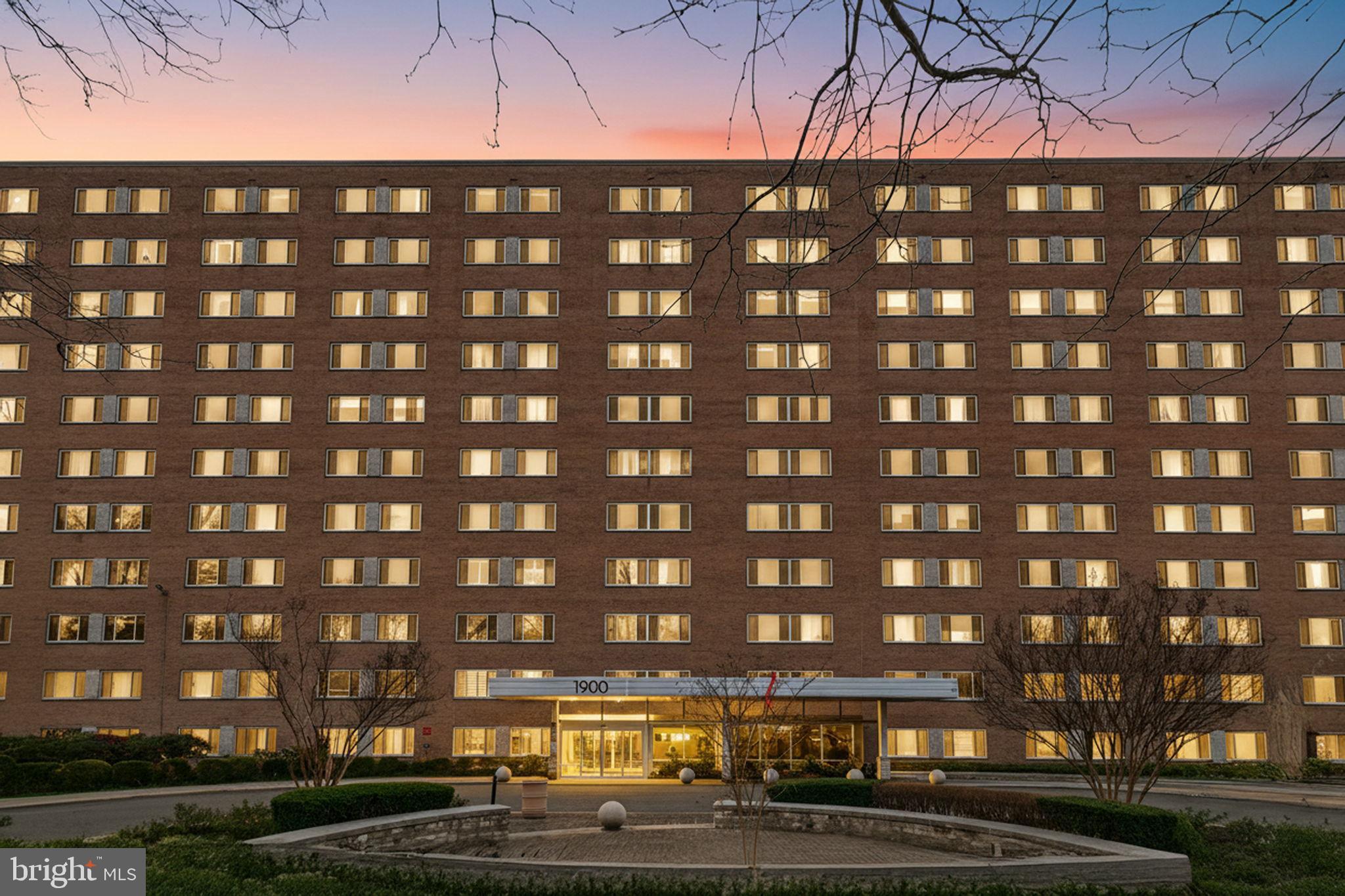 1900 Lyttonsville Road, Unit 618 Silver Spring, MD 20910 - Photo 2 of 36 Modern residence glowing at twilight.