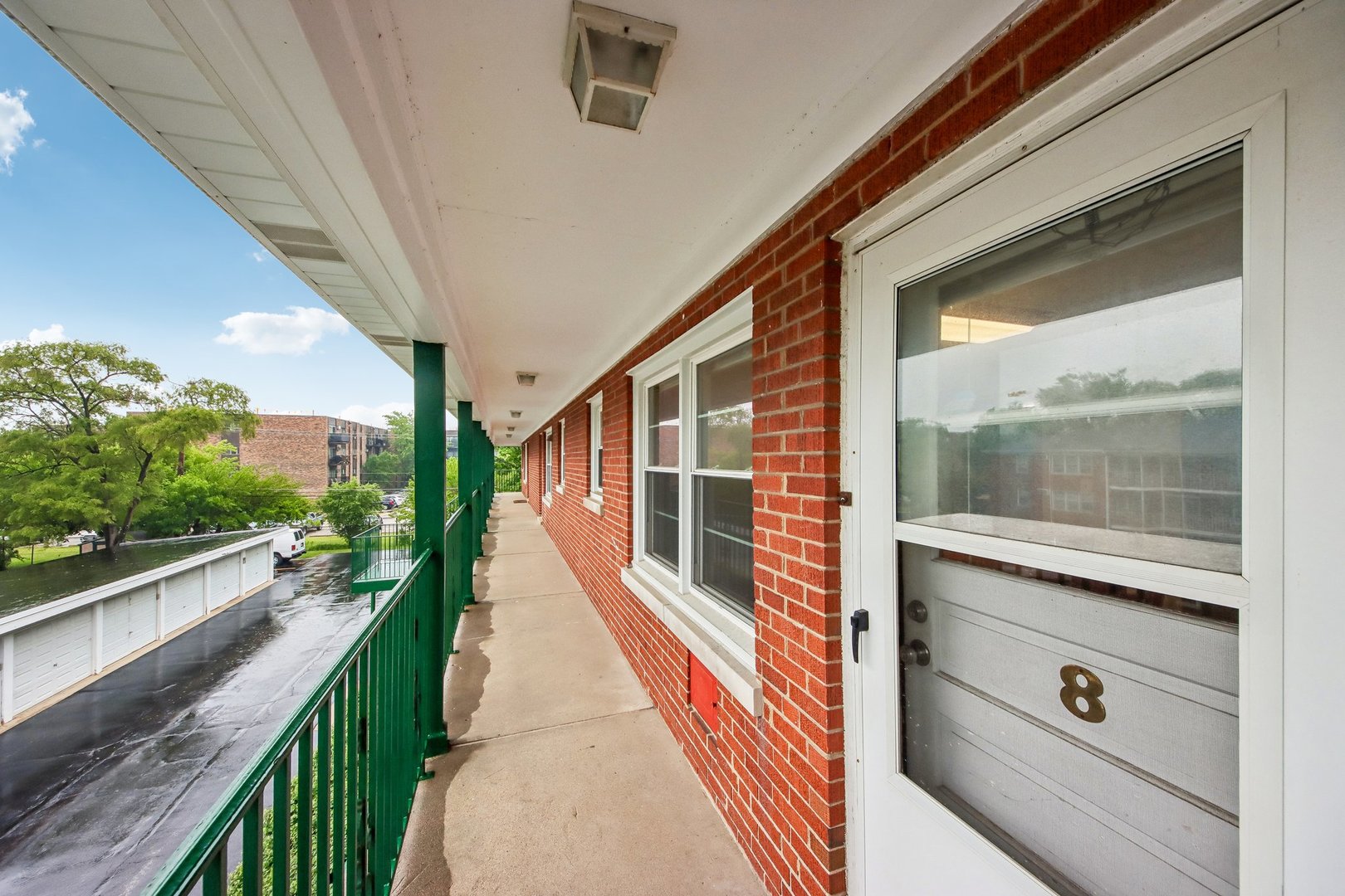 1855 Parkside Drive, Unit 8 Park Ridge, IL 60068 - Photo 4 of 22 a view of a balcony with outdoor space