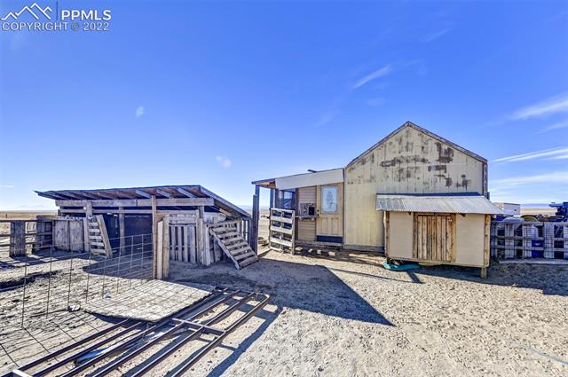 13190 South Lauppe Road Yoder, CO 80864 - Photo 8 of 10 There are multiple small animal structures in the corral.