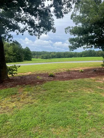 a view of a golf course with a lake