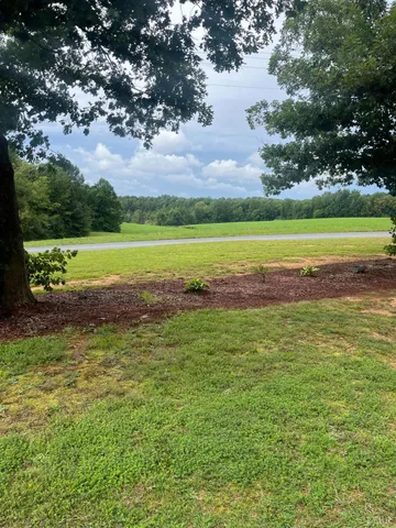 a view of a golf course with a lake