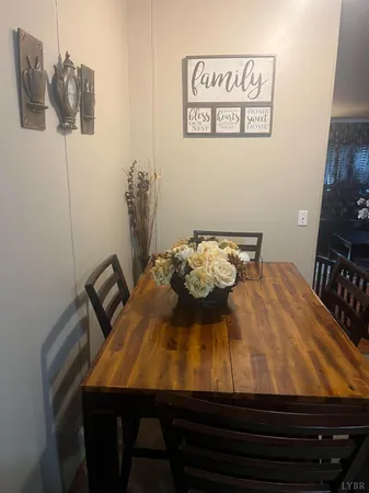 a view of a dining room with furniture