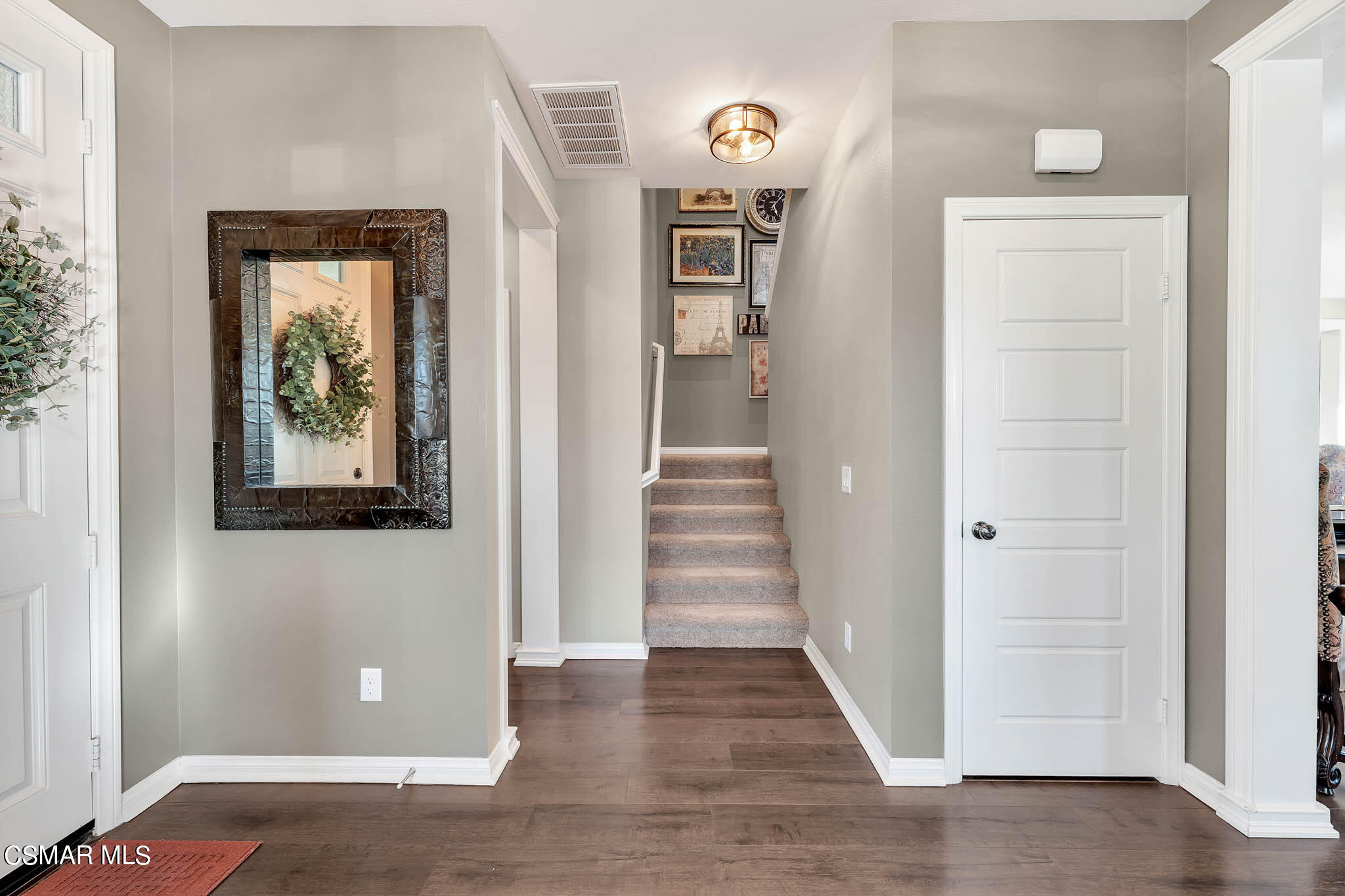 324 River Street Fillmore, CA 93015 - Photo 14 of 48 a view of a hallway with wooden floor and entryway