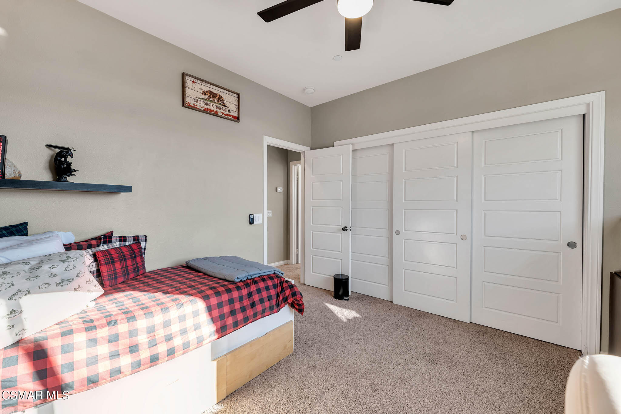 324 River Street Fillmore, CA 93015 - Photo 23 of 48 a bedroom with a bed and a walk in closet