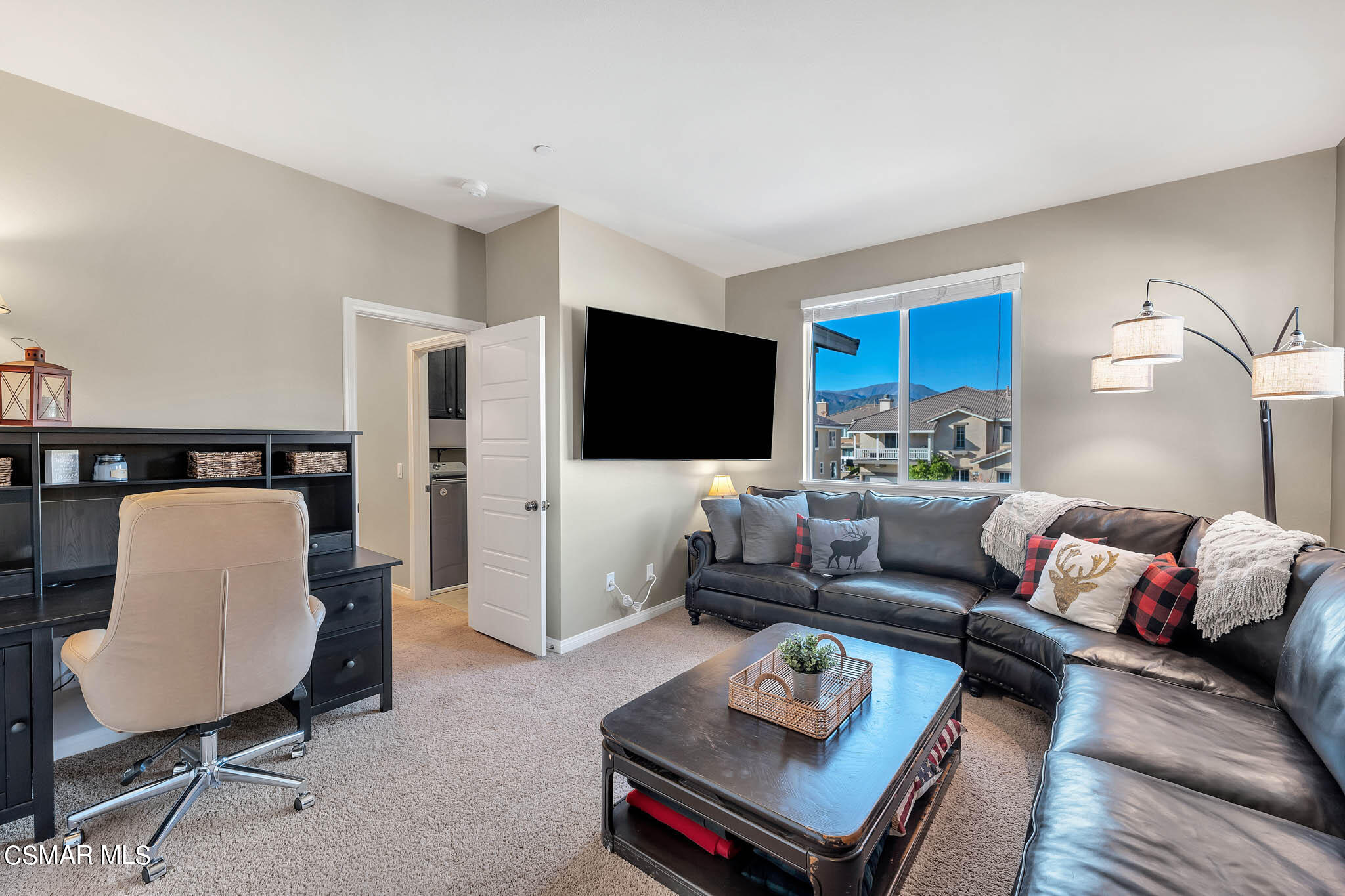 324 River Street Fillmore, CA 93015 - Photo 27 of 48 a living room with furniture and a flat screen tv