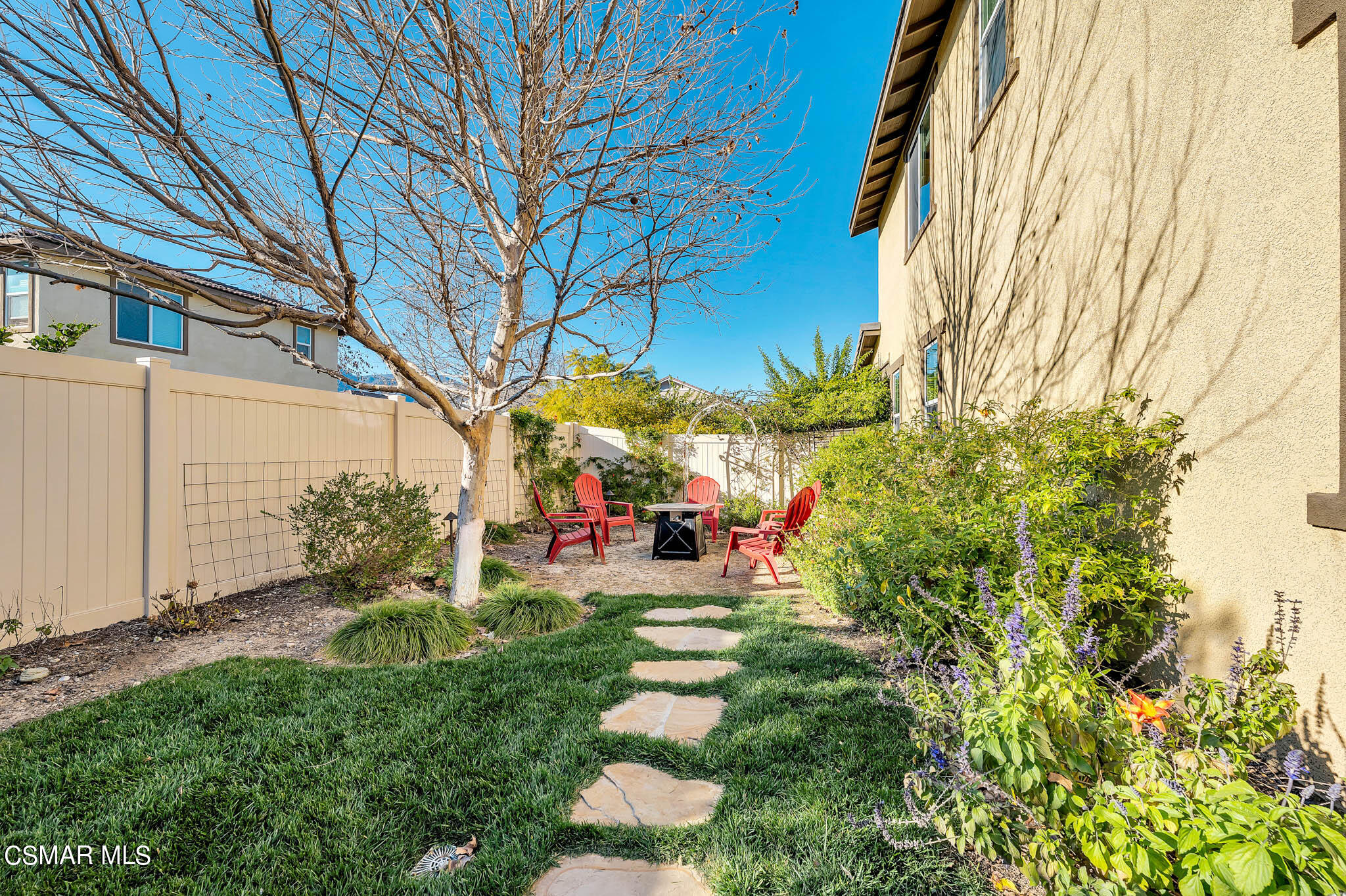 324 River Street Fillmore, CA 93015 - Photo 36 of 48 a view of a backyard with plants and a patio