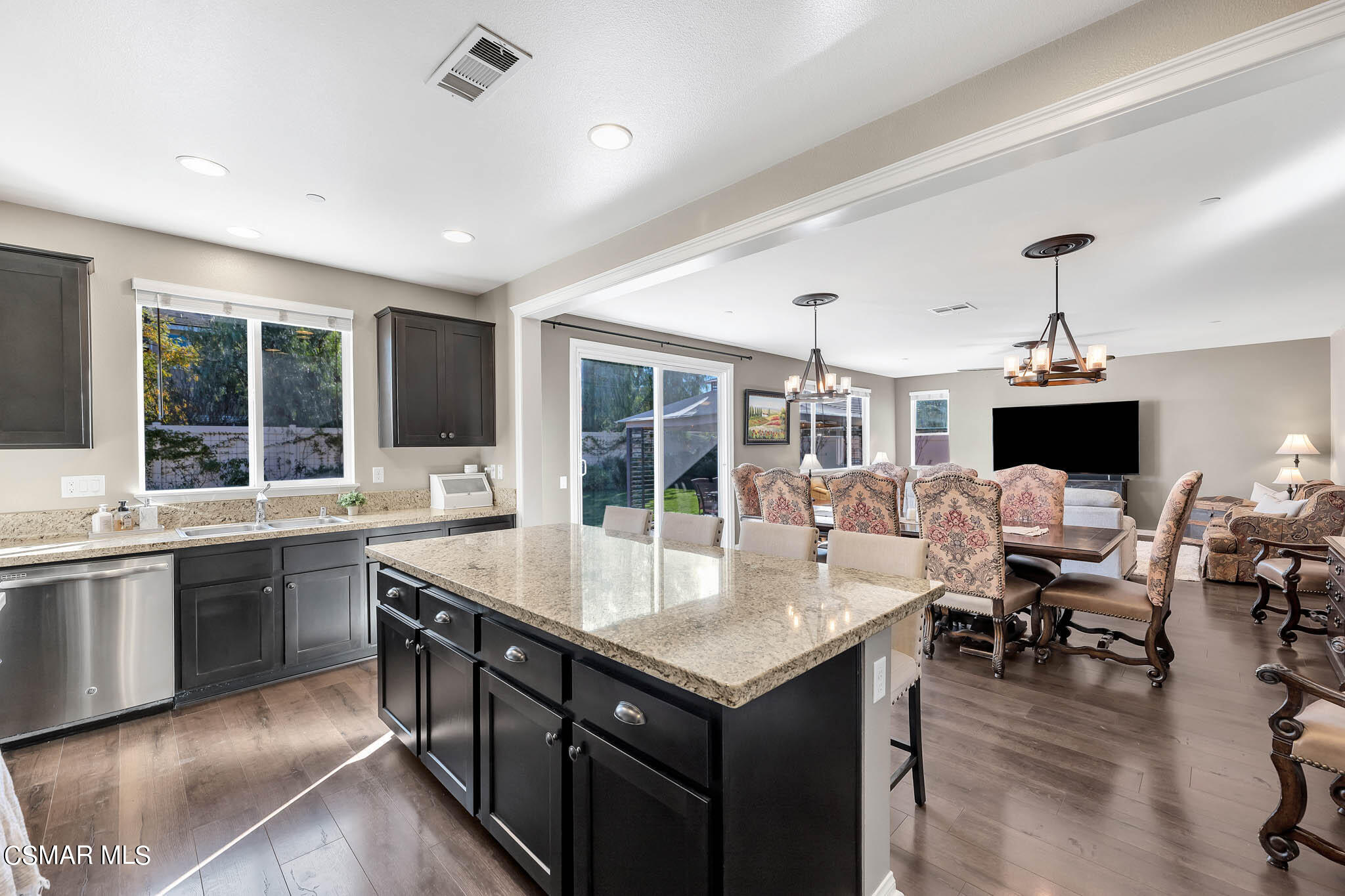 324 River Street Fillmore, CA 93015 - Photo 4 of 48 a large kitchen with kitchen island a sink and a stove
