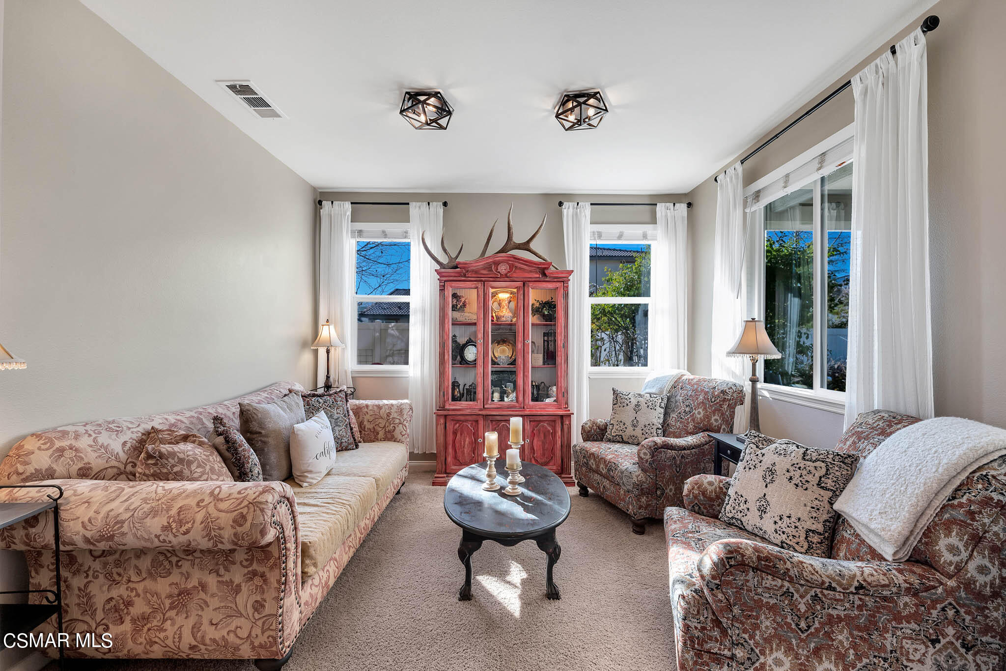 324 River Street Fillmore, CA 93015 - Photo 10 of 48 a living room with furniture or couch and a large window