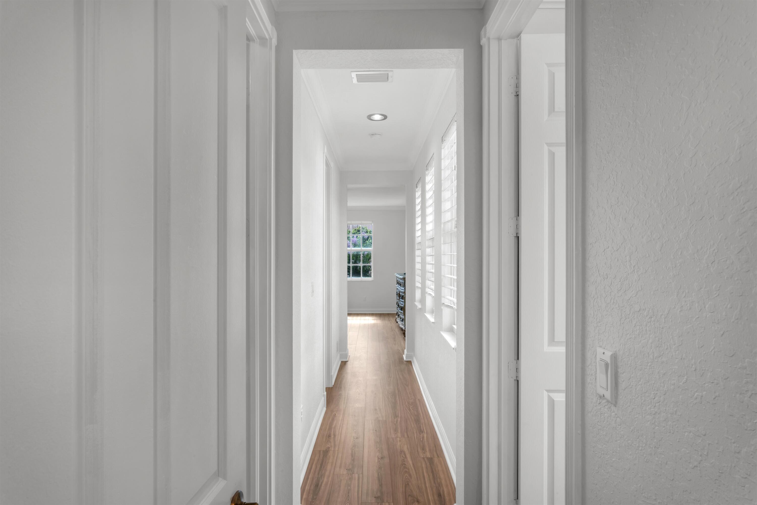 8300 Northwest 9th Avenue Boca Raton, FL 33487 - Photo 11 of 23 HALLWAY_TO_PRIMARY