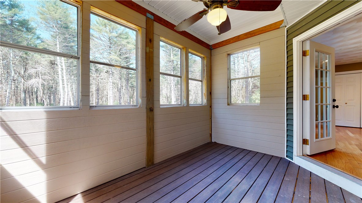 65 Woodville Alton Road Hopkinton, RI 02894 - Photo 17 of 35 3 season room off the dining/kitchen area