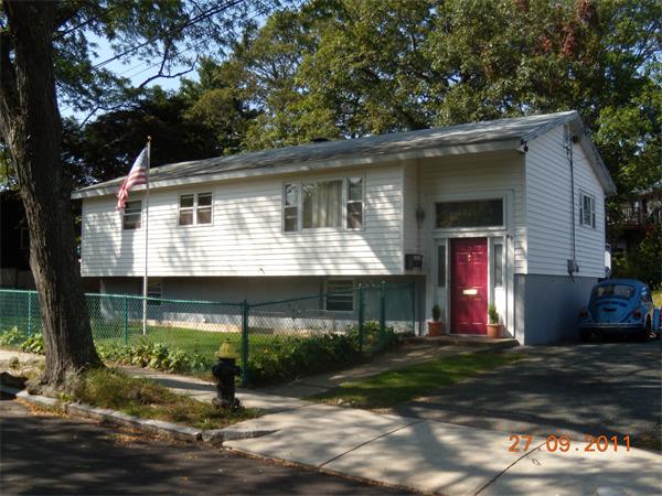 49 Leighton Road Boston, MA 02136 - Photo 1 of 12 a front view of house with yard and green space
