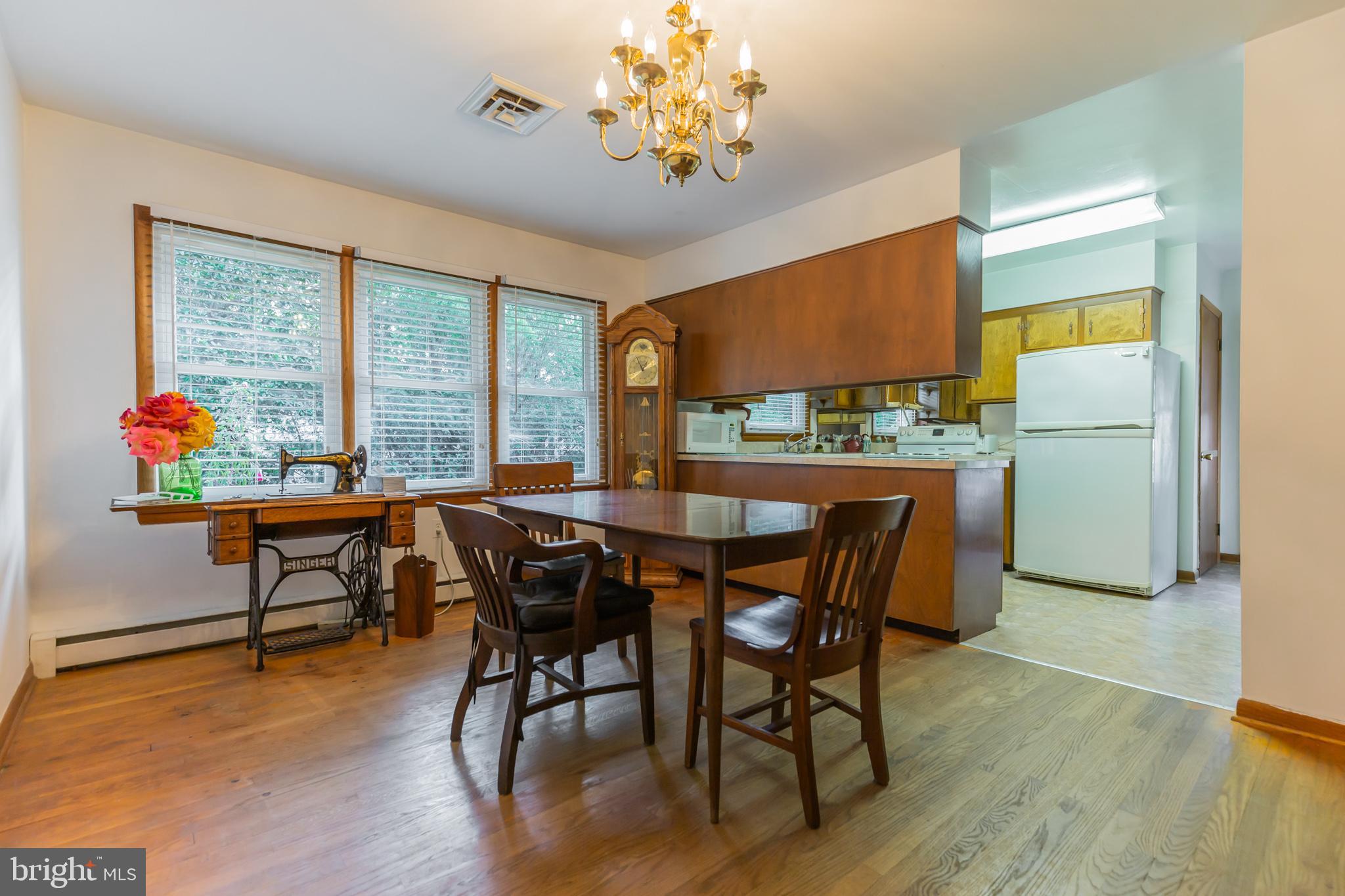 13620 Dowell Road Solomons, MD 20629 - Photo 11 of 28 Dining room with triple window.