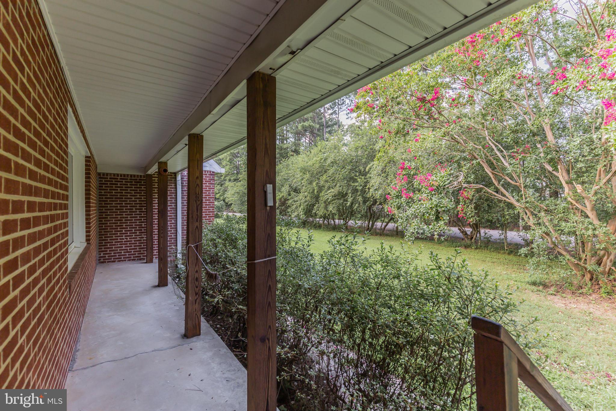 13620 Dowell Road Solomons, MD 20629 - Photo 23 of 28 Front porch faces Appel Lane.