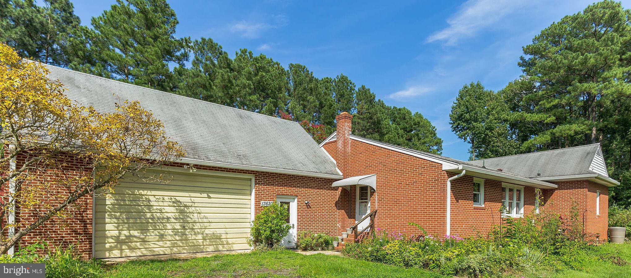13620 Dowell Road Solomons, MD 20629 - Photo 4 of 28 Arrival to the all brick home, large garage.