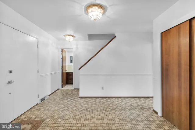 a view of a room with a large window