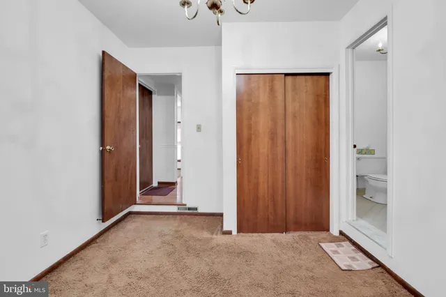 a bathroom with a sink a tub and a mirror