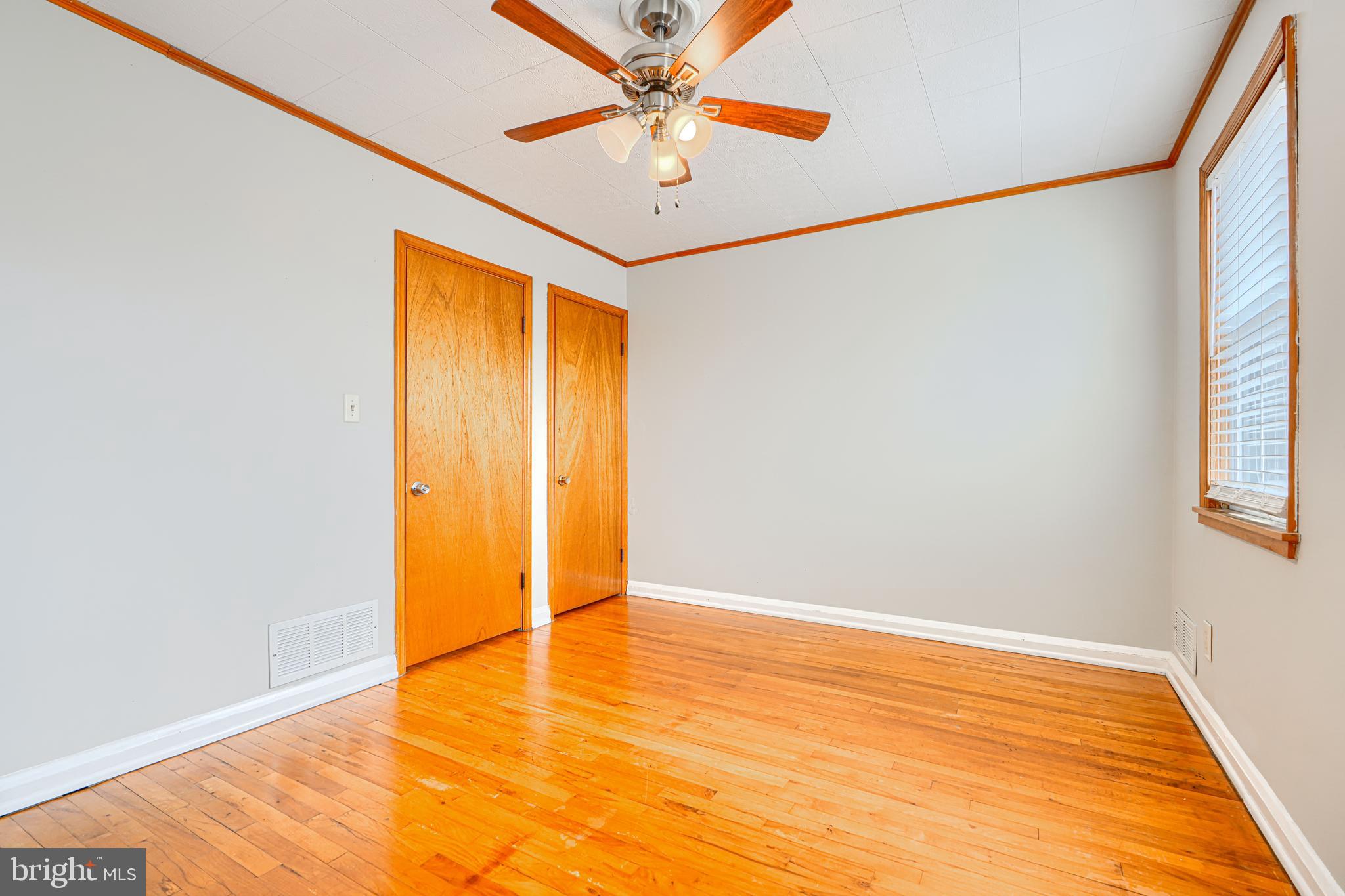 6905 Bank Street Baltimore, MD 21224 - Photo 10 of 17 a view of an empty room with a window