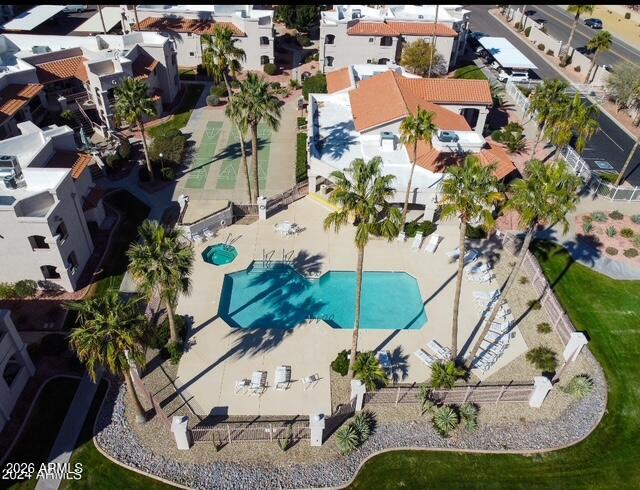 9151 West Greenway Road, Unit 239 Peoria, AZ 85381 - Photo 8 of 18 an aerial view of a house with a yard and lake view