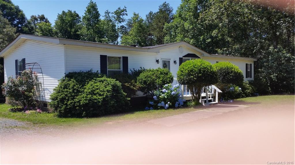 6016 Ra Austin Road Marshville, NC 28103 - Photo 1 of 13 an aerial view of a house with a yard