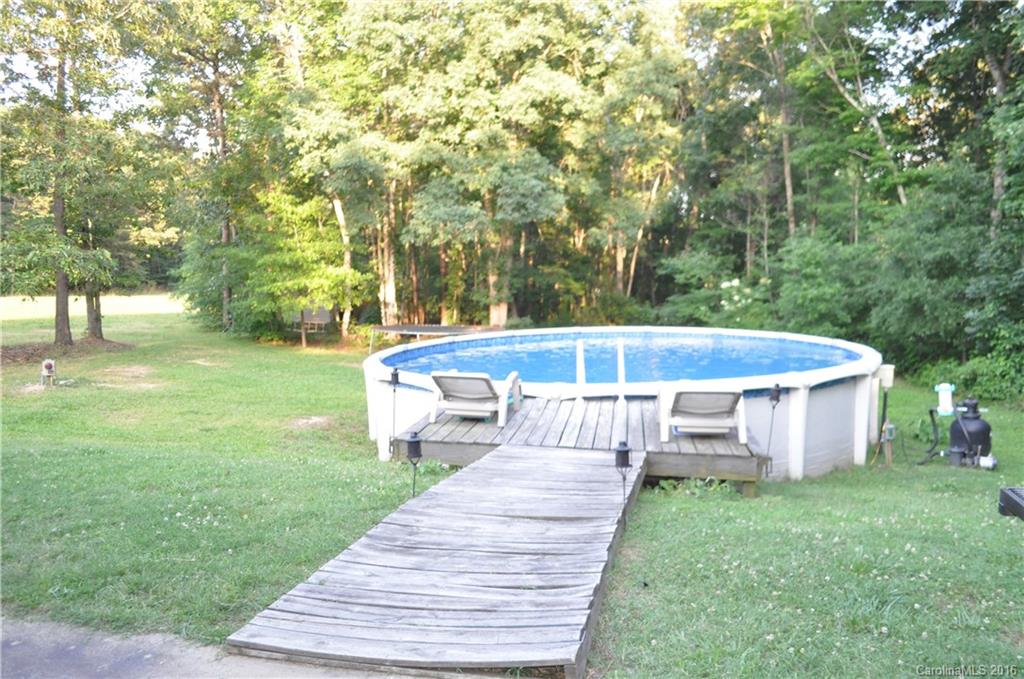 6016 Ra Austin Road Marshville, NC 28103 - Photo 11 of 13 a front view of a house with garden