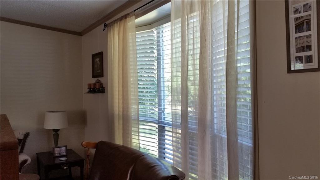 6016 Ra Austin Road Marshville, NC 28103 - Photo 6 of 13 a bedroom with furniture and a window