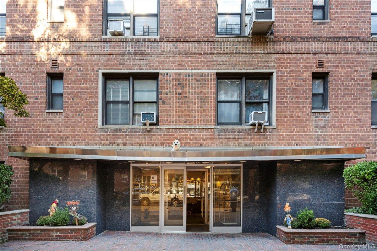 110-45 71st Road, Unit 6D Queens, NY 11375 - Photo 19 of 20 View of exterior entry featuring brick siding