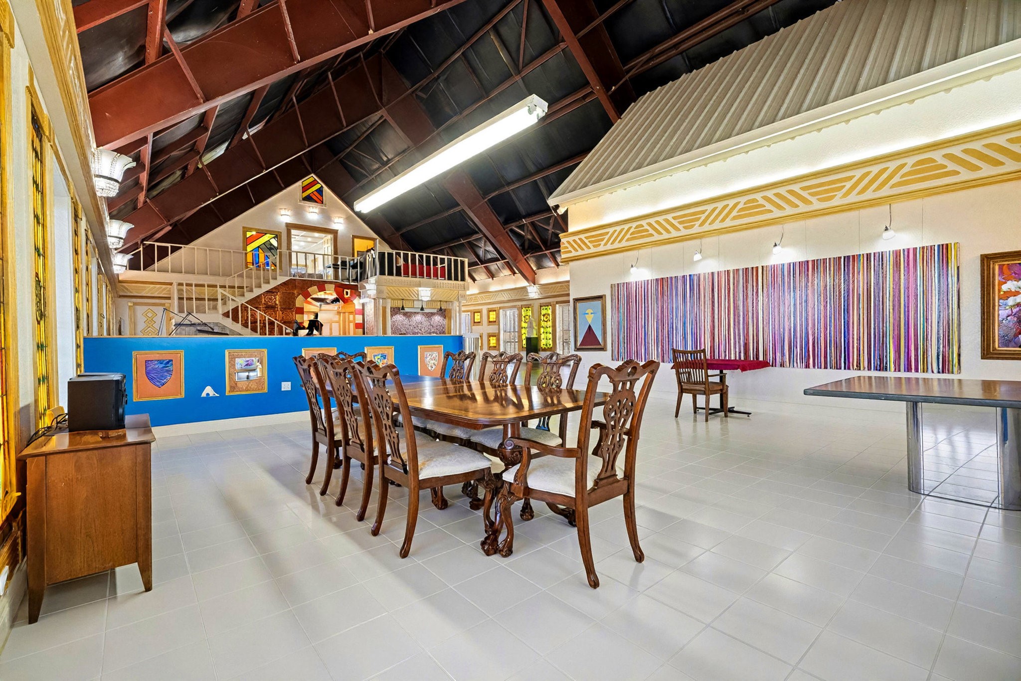 1200 Davenport Parkway Rosharon, TX 77583 - Photo 11 of 49 Expansive formal dining area with seating for twelve, artistic wall installations, and
dramatic exposed beam ceiling design.