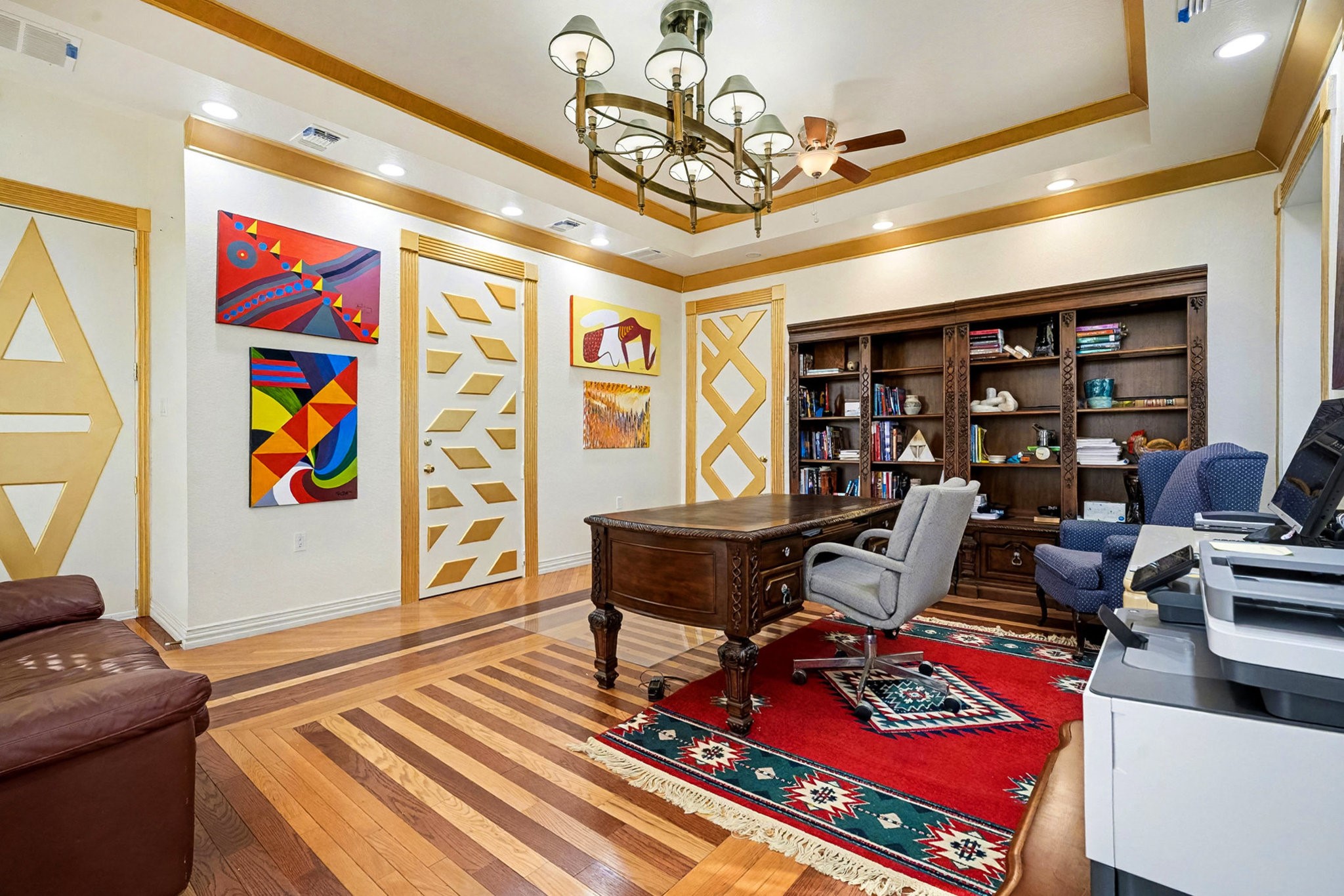 1200 Davenport Parkway Rosharon, TX 77583 - Photo 13 of 49 Executive-style study featuring built-in bookshelves, designer ceiling trim, and artistic
geometric door accents.