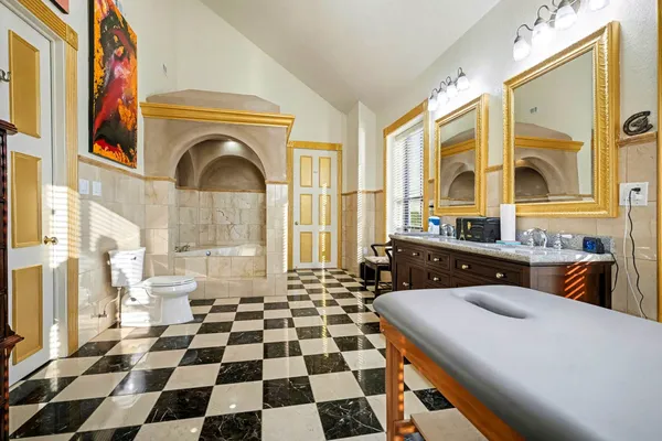 a bedroom with a bed and furniture