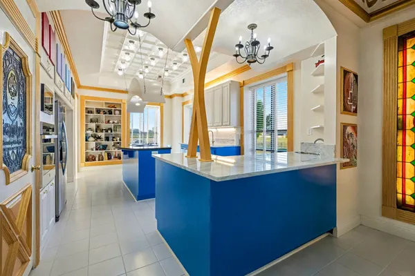 a large kitchen with a large window