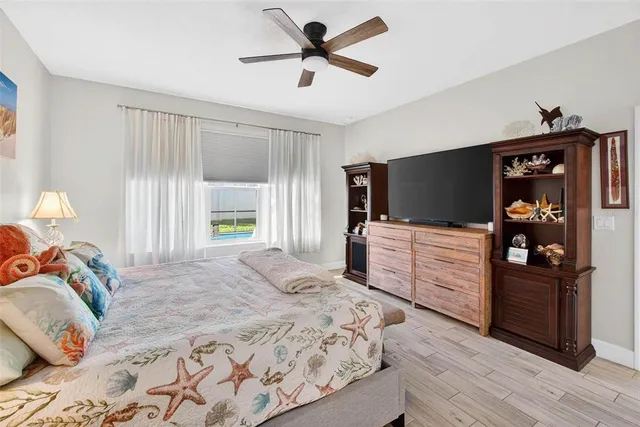 a bathroom with a double vanity sink mirror and shower