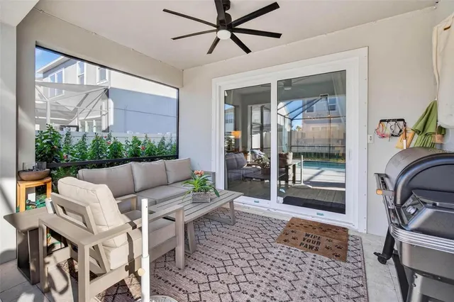 a view of a swimming pool with a patio